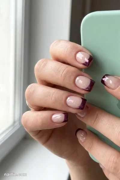 Close-up of short square nails with deep plum chrome French tips — look 2