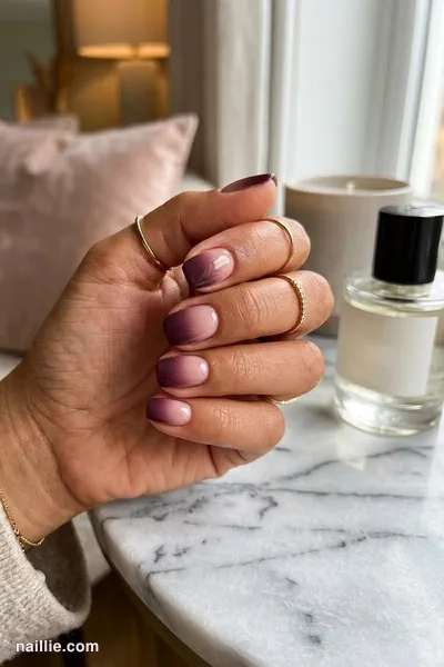 Close-up of squoval nails with a deep plum ombre fading into nude — look 3