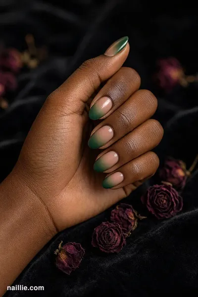 Close-up of oval nails with a forest green ombre fading into nude — look 2