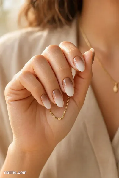 Close-up of almond nails with a soft mocha baby boomer fade — look 2
