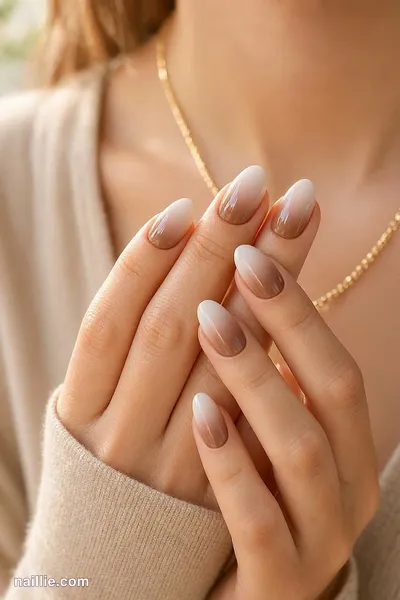 Close-up of almond nails with a soft mocha baby boomer fade — look 3