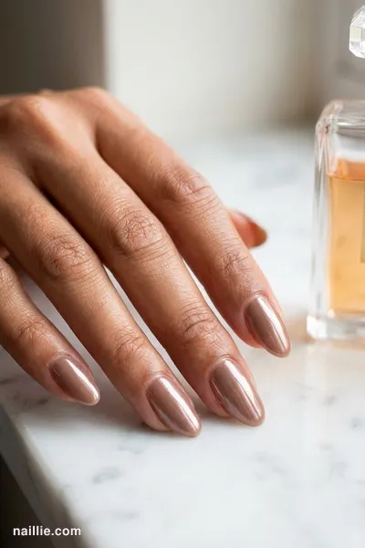 Close-up of oval nails with mocha polish and a pearly glazed-donut shimmer — look 2