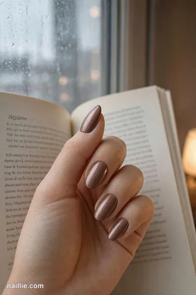 Close-up of oval nails with mocha polish and a soft velvet shimmer — look 4