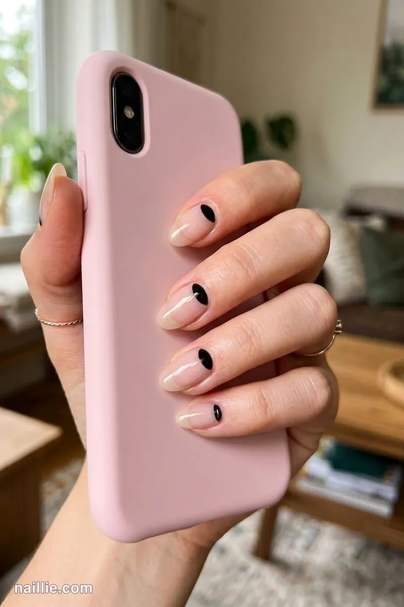 Close-up of almond nails with clean negative space half-moons